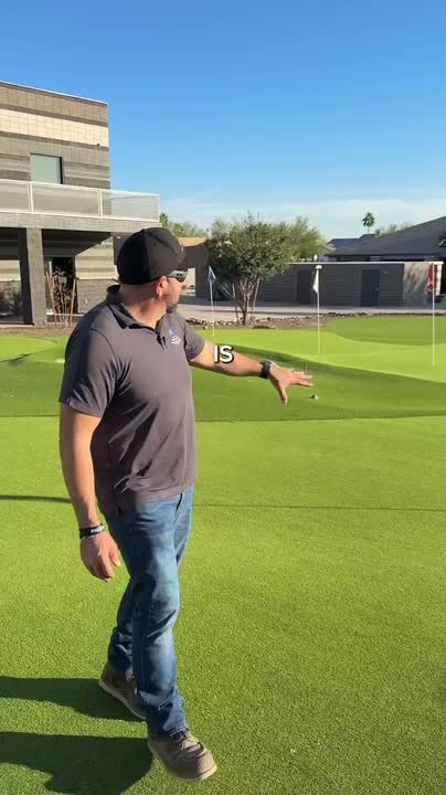 Putting green with 70-yard chipping pad and cups that light up at night