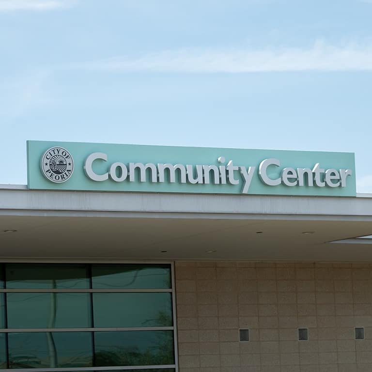 Peoria Community Center sign where the backpack drive was hosted