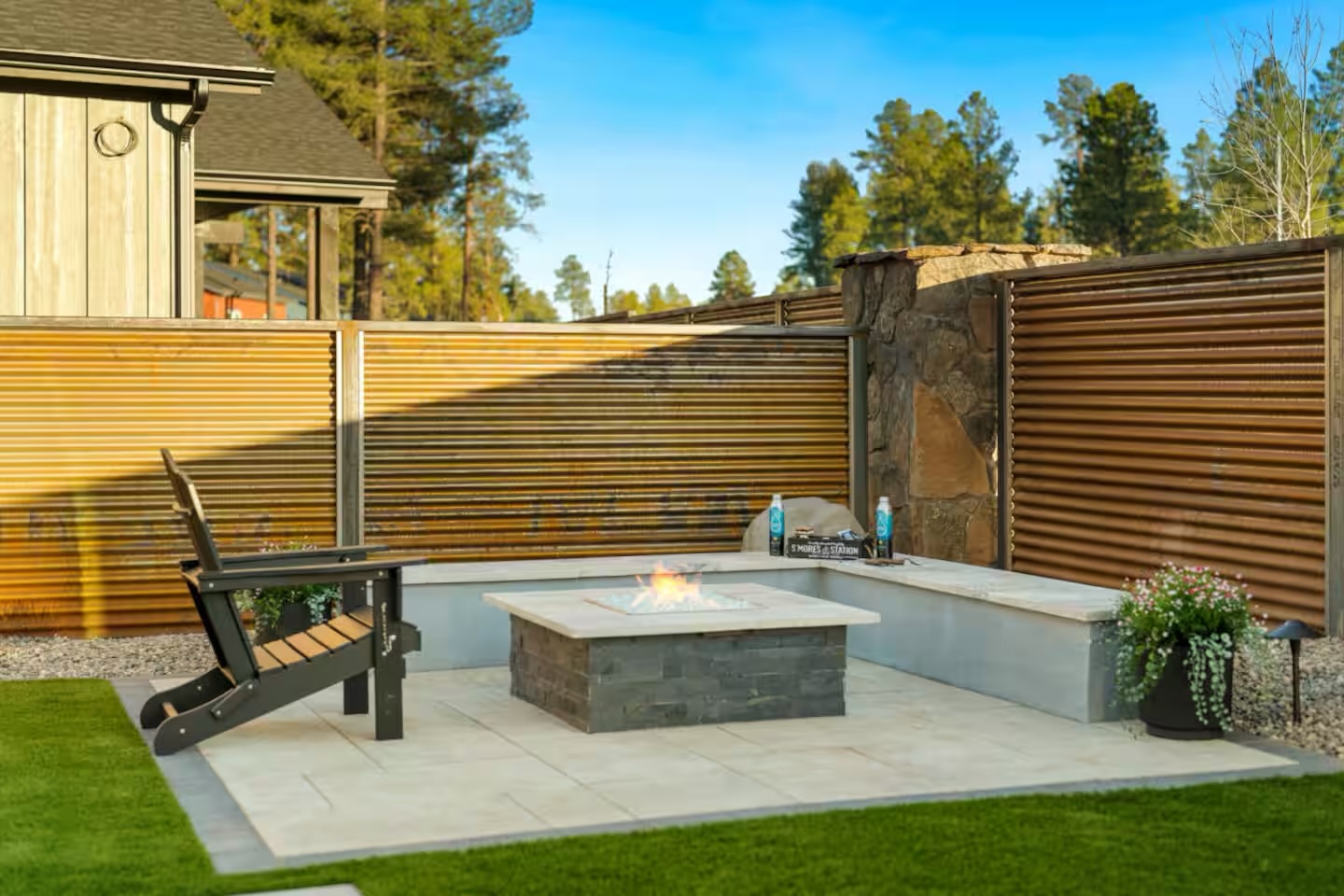 Custom fire feature with stone surround integrated into an Arizona outdoor living space