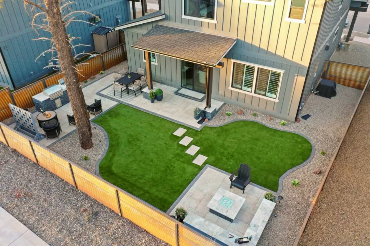 Full Arizona backyard transformation — pool, paver patio, turf, and shade structure by AE Outdoor Living