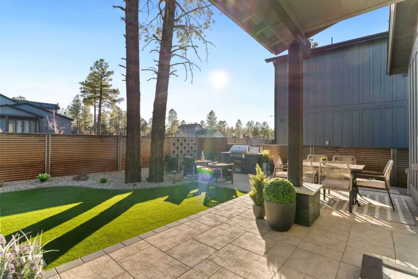 Pet-rated artificial turf landscape with cool-fill in an Arizona backyard