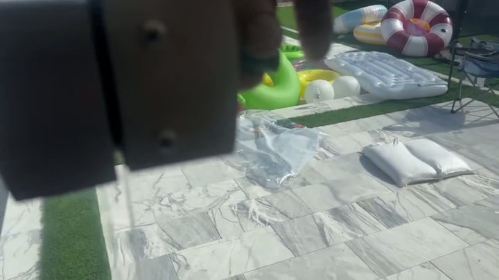 Video preview of a glass fence beside a pool deck
