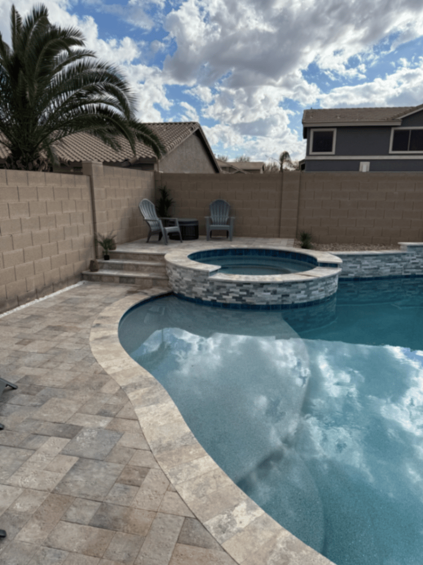 Thorn residence Mesa AZ raised spa with travertine steps and Adirondack seating area