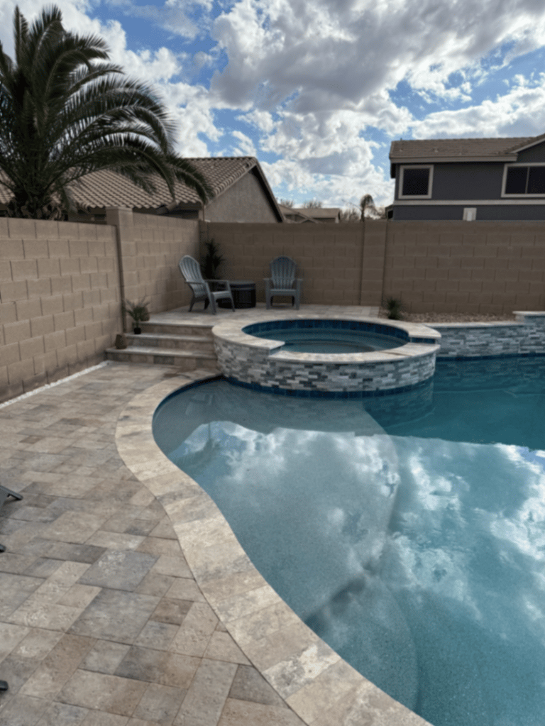 Thorn residence Mesa AZ raised spa with travertine steps and Adirondack seating area