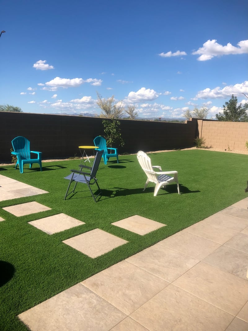 Buckeye artificial turf lawn with inset paver stepping stones and mountain view