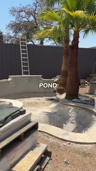 Showroom splash pad + pond — National Pool Tile, Noble Tile, Rain Deck partners