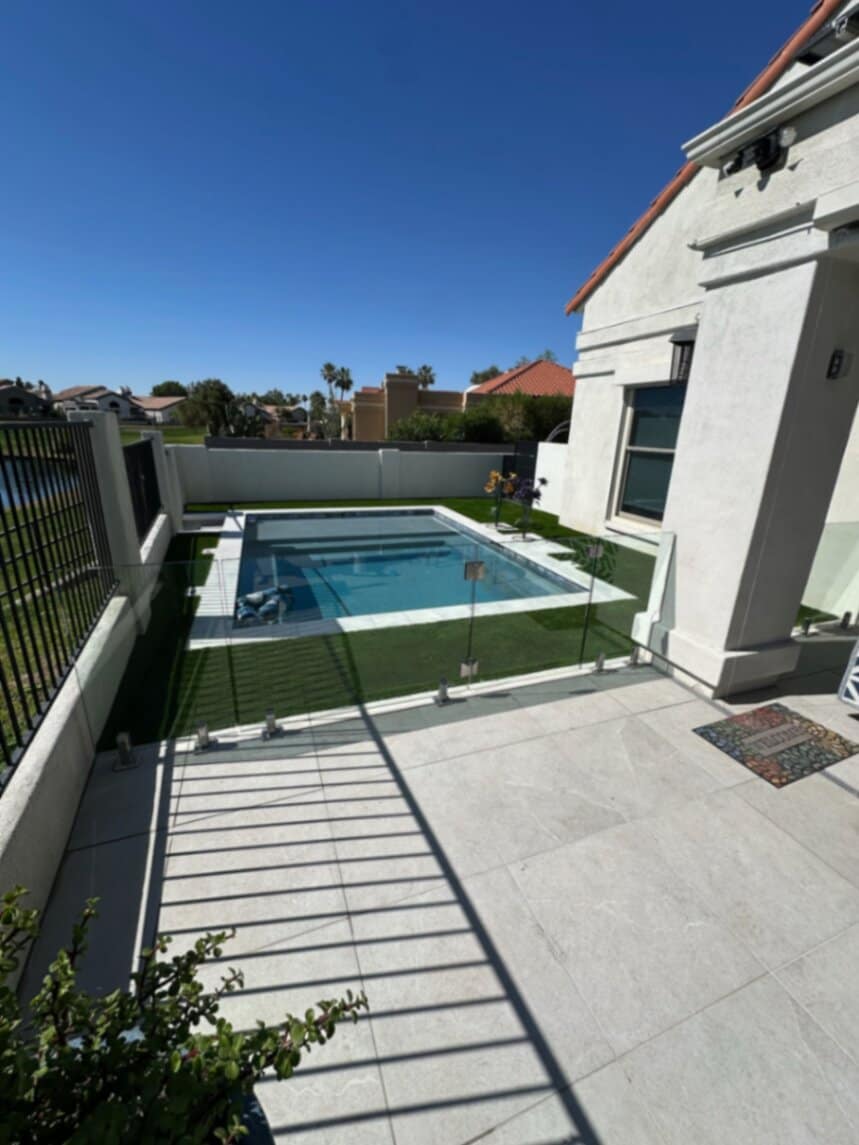 Travertine paver patio installation on engineered base for an Arizona backyard
