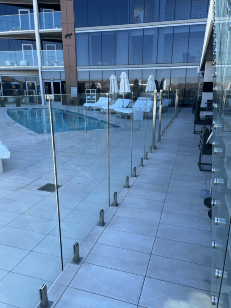 Completed AE Outdoor Living project at Caesars Republic Scottsdale — Rooftop Pool Glass Fence in Scottsdale, AZ (image 2)