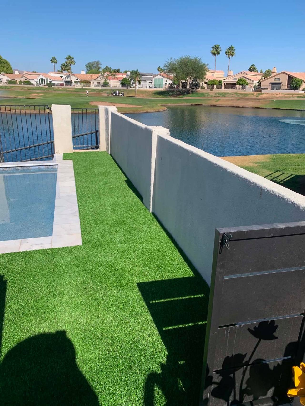 Pet-rated artificial turf landscape with cool-fill in an Arizona backyard