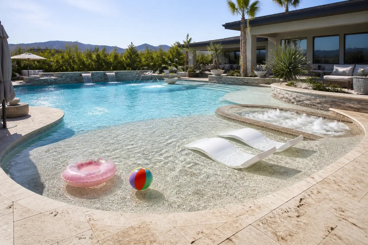 Kids Shallow Play Pool — Family-first design with massive shallow play zone. by AE Outdoor Living